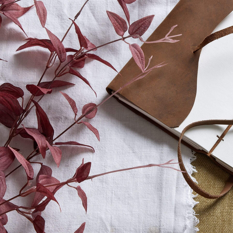 Burgundy plastic botanical stem with wispy tendrils, 88cm tall, for elegant year-round floral arrangements by Sostter at brixbailey.com