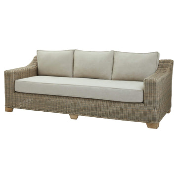 Handcrafted beige wicker sofa with HDPE weave, aluminum frame, and acacia wood feet for outdoor patio luxury by Sostter at brixbailey.com