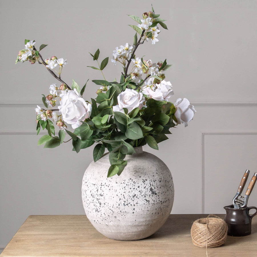 Lifelike artificial eucalyptus stems in silver-sage green, perfect for vase arrangements and home decor by Sostter at brixbailey.com