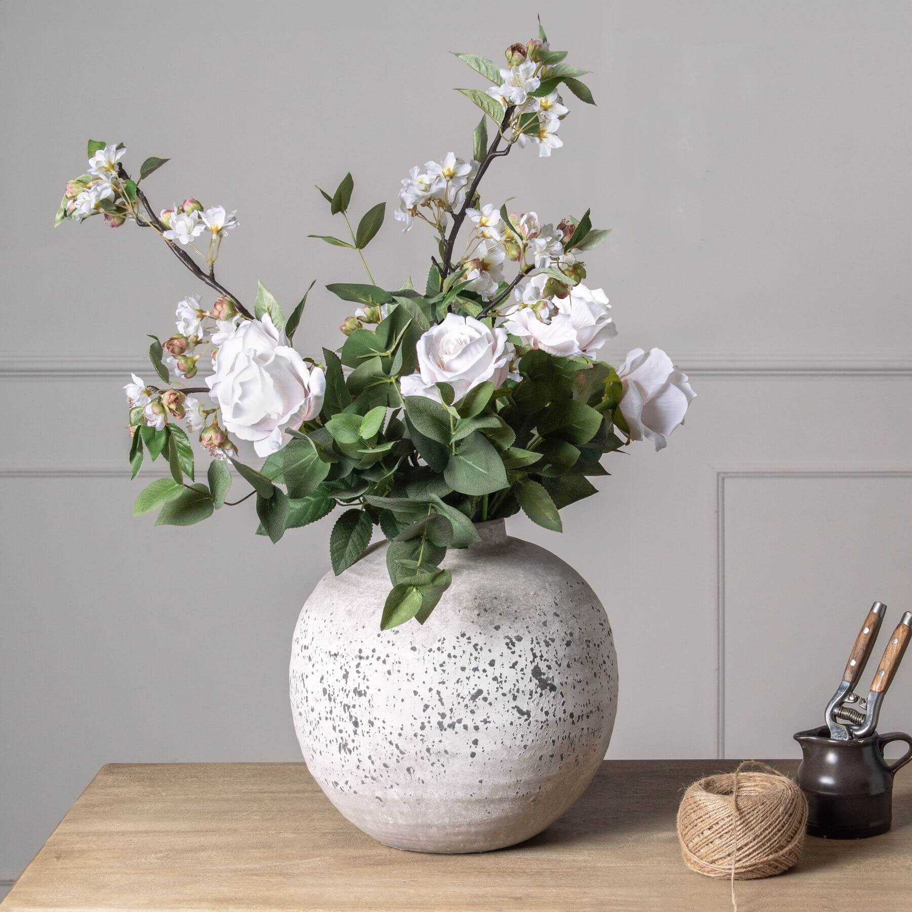Neutral stone ceramic vase from Tiber series, minimalist design for floral arrangements, 28cm cube shape. by Sostter at brixbailey.com