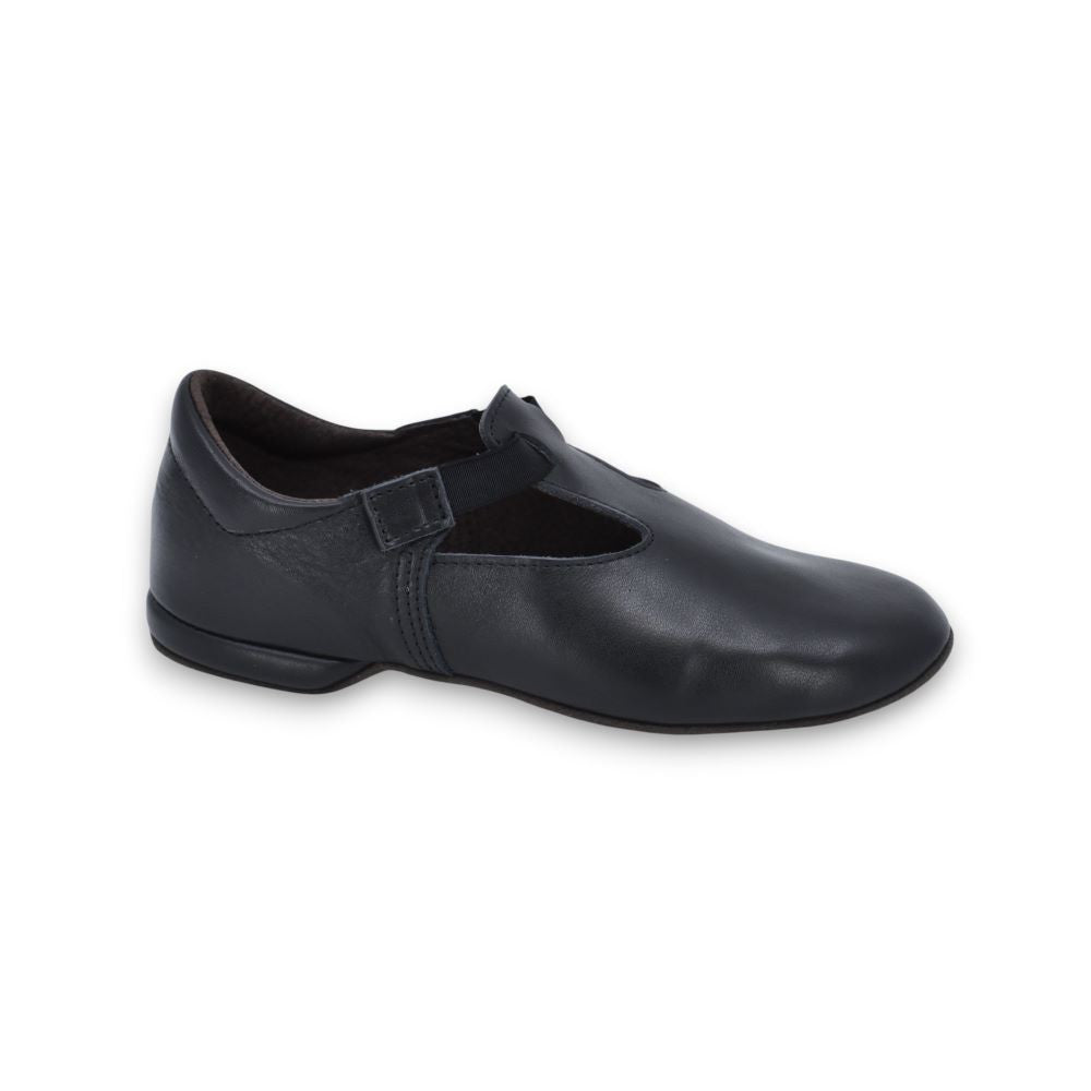 kergatsi dance slippers in soft leather with a 1cm heel, shown on a wooden floor with warm natural lighting