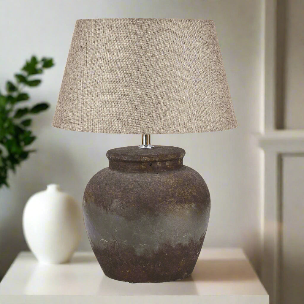 Handcrafted ceramic table lamp in warm beige with rustic stone texture, 52cm tall, perfect for modern or traditional decor. by Sostter at brixbailey.com