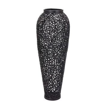 Matte black perforated steel vase with geometric cutouts, creating dynamic light patterns, 90cm tall, modern home decor by Sostter at brixbailey.com