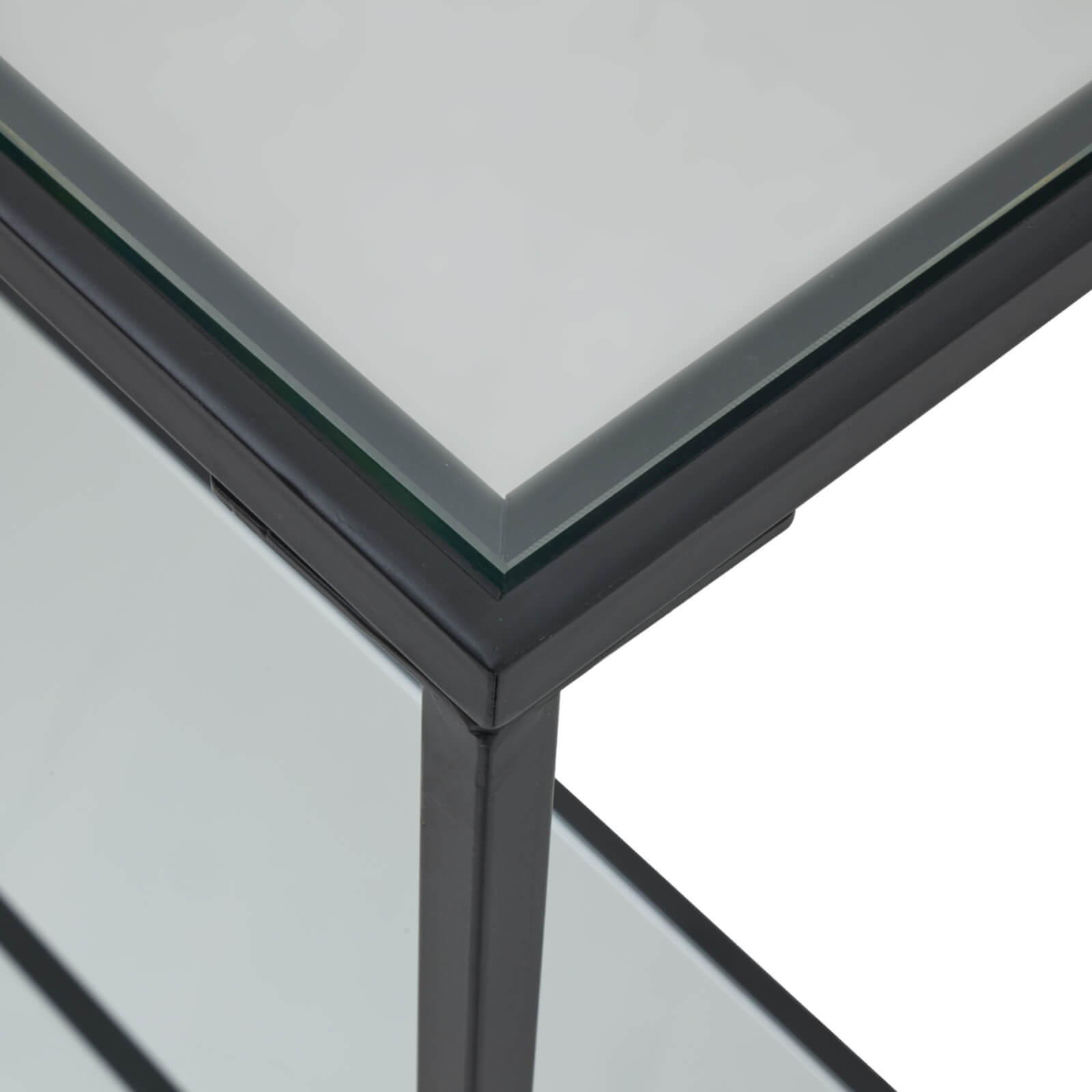 Lennox console table with black metal frame and glass top, minimalist industrial design for modern interiors by Sostter at brixbailey.com