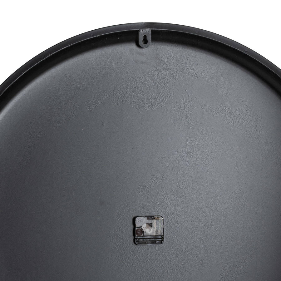 80cm grey metal wall clock with industrial minimalist design, casting dynamic light patterns, modern home decor by Sostter at brixbailey.com