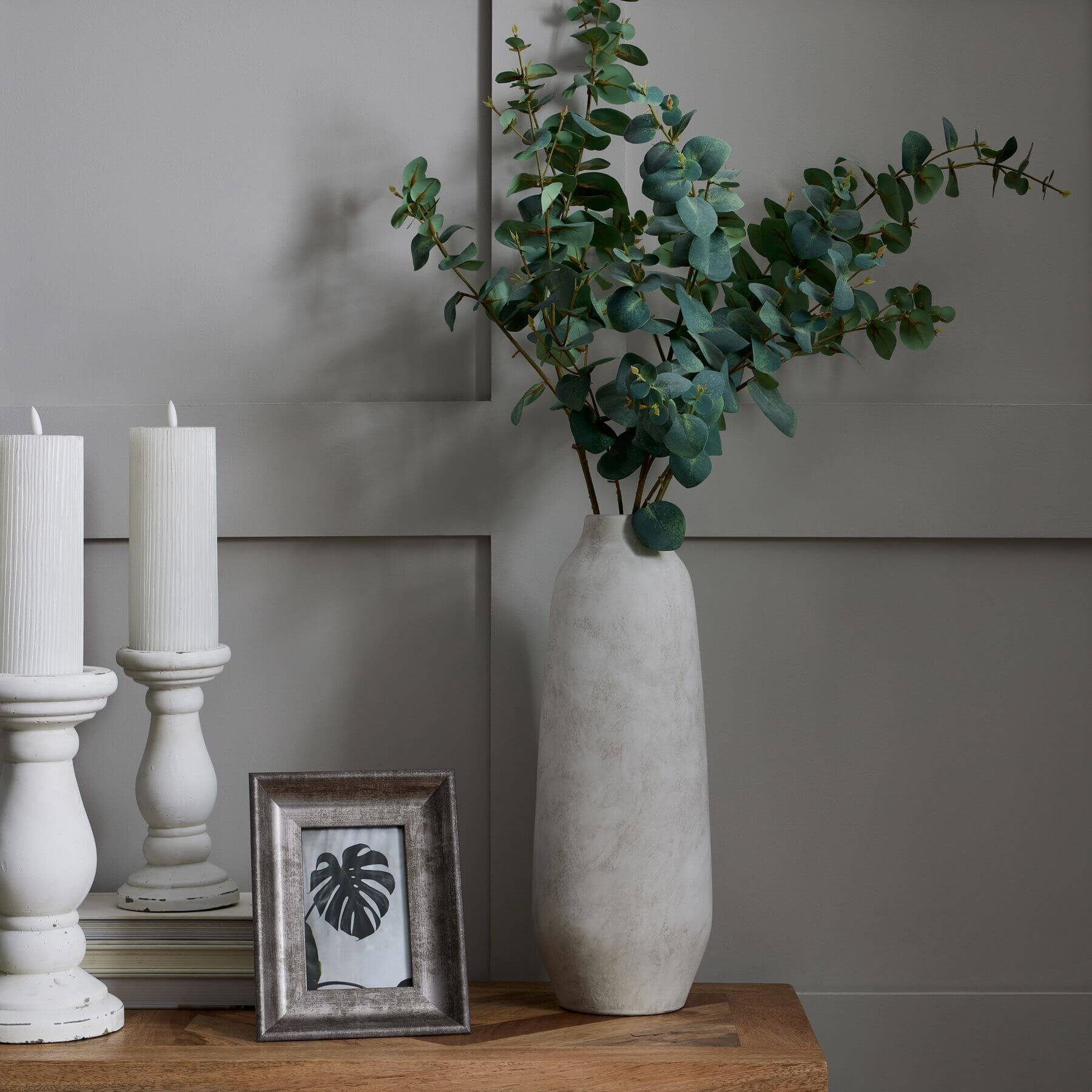 Handcrafted stoneware vase with matte stone finish, textured surface, and neutral hue for modern or traditional decor. by Sostter at brixbailey.com
