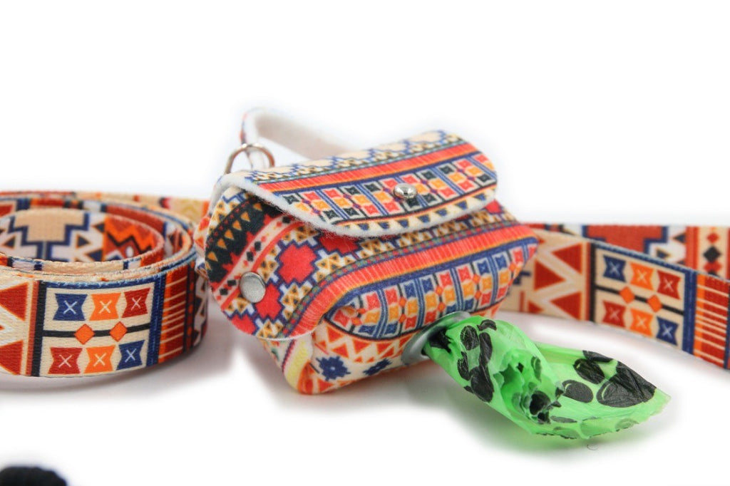 functional boho dog bag dispenser on a leash during an afternoon walk