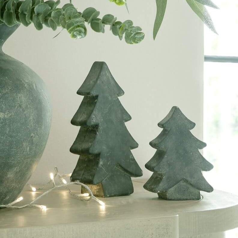 Luxurious grey ceramic Christmas tree with shimmering finish, 24 cm tall, perfect for modern holiday dÃ©cor displays.by Sostter at brixbailey.com