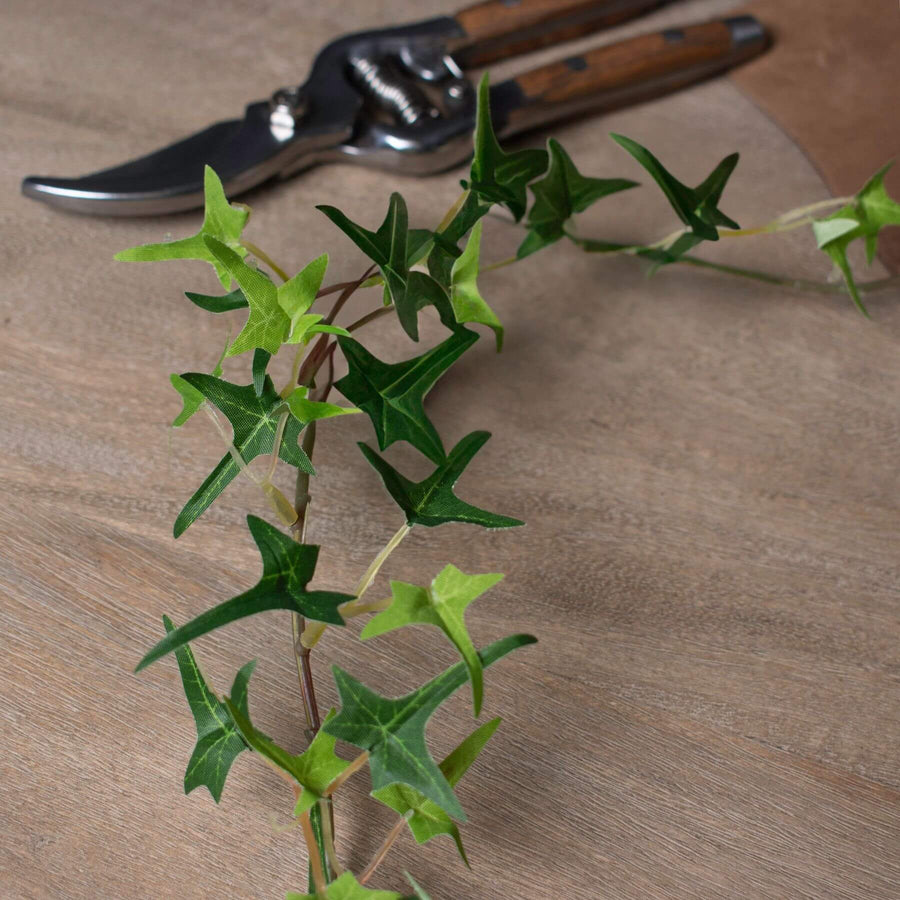 Lifelike artificial ivy garland with realistic green leaves, perfect for shelves or mantels, 170 cm long, fade-resistant plastic. by Sostter at brixbailey.com