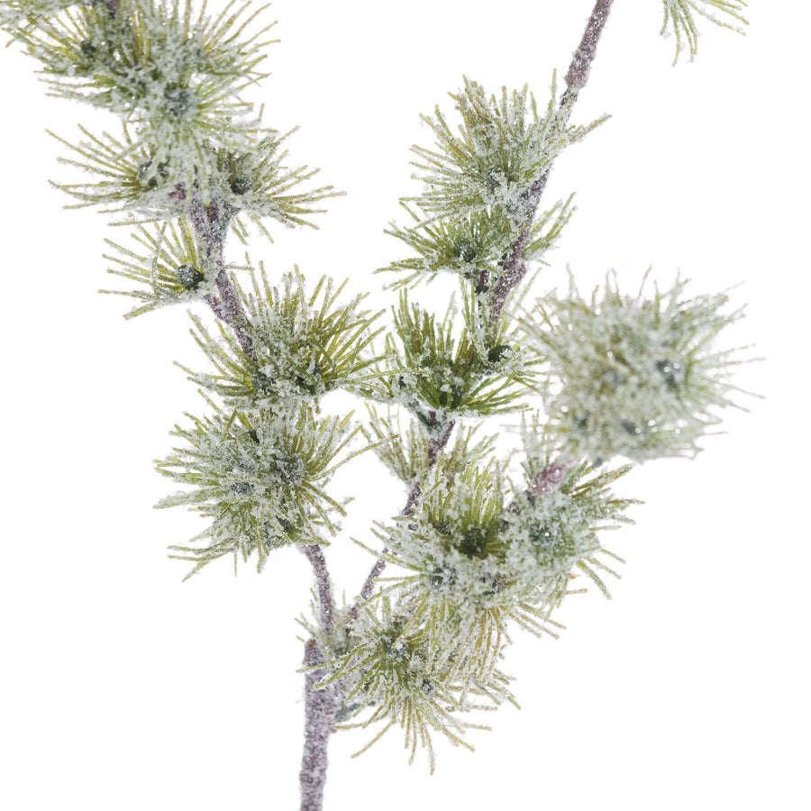 Handcrafted snow branch with lifelike frost details, crystalline accents, and realistic plastic texture for winter decor. by Sostter at brixbailey.com