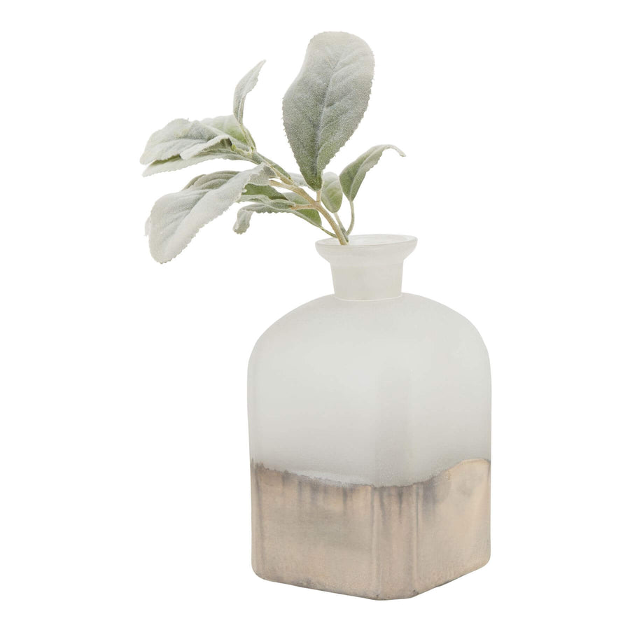 Handcrafted brass candle holder vase with burnished finish, aged detailing, and warm grey glass for elegant home decor. by Sostter at brixbailey.com