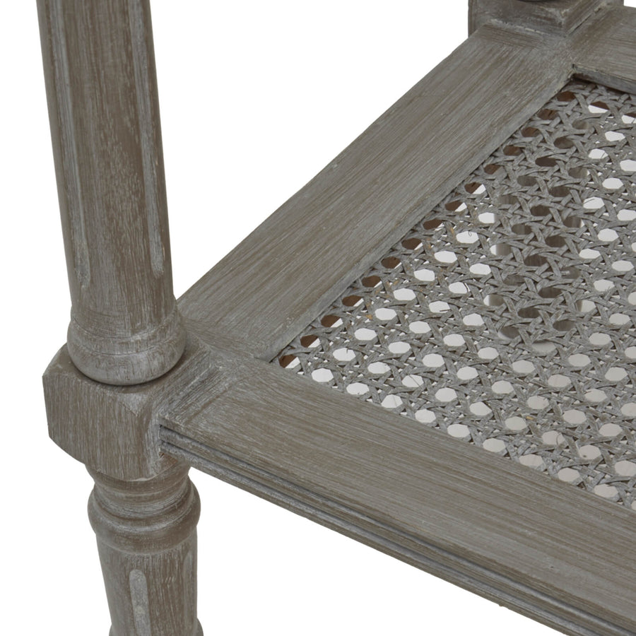 Handwoven rattan console table with tapered legs in soft grey finish, perfect for modern farmhouse or coastal decor. by Sostter at brixbailey.com