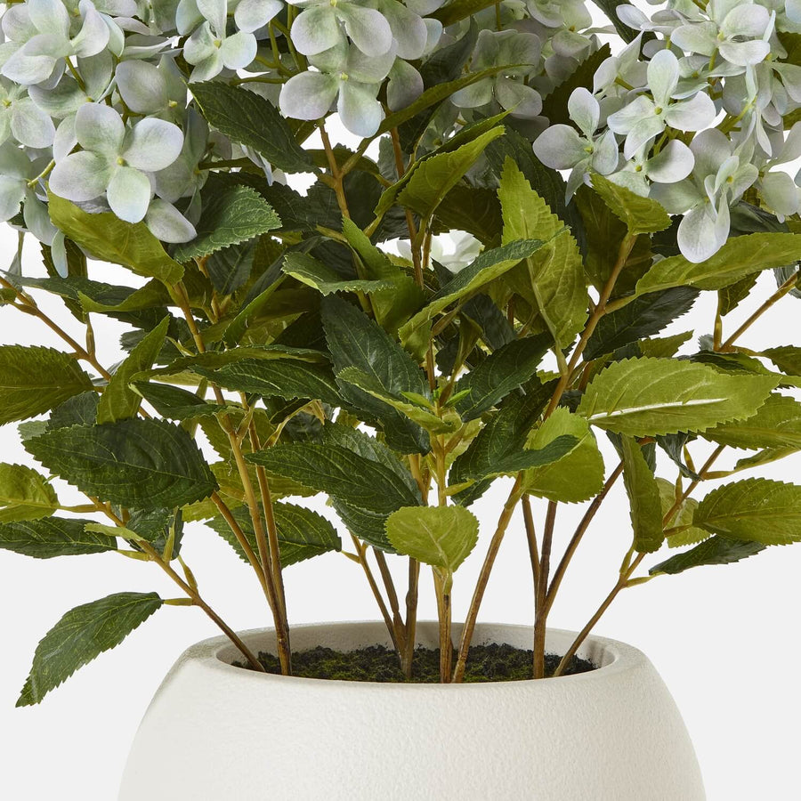 Lifelike faux green hydrangea plant with white blooms and lush foliage for home decor, 58cm tall by Sostter at brixbailey.com