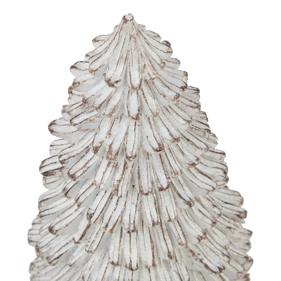 Handcrafted snowy fir tree sculpture in white resin with lifelike snow-dusted evergreen details, 25cm tall. by Sostter at brixbailey.com