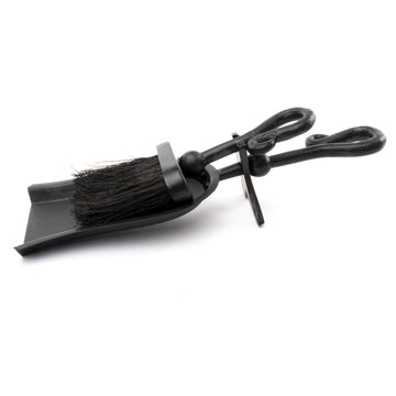 Black Crook Handled Hearth Tidy with sleek metal finish, ergonomic handle, and artisanal design for fireplace tools. by Sostter at brixbailey.com