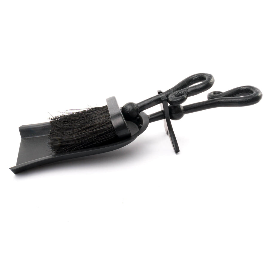 Black Crook Handled Hearth Tidy with sleek metal finish, ergonomic handle, and artisanal design for fireplace tools. by Sostter at brixbailey.com