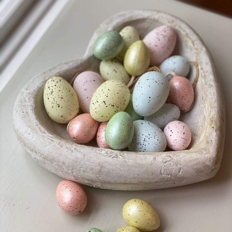 Handcrafted stone heart dish in warm cream with rustic antiqued finish, 23cm wide, perfect for decor or catchall by Sostter at brixbailey.com