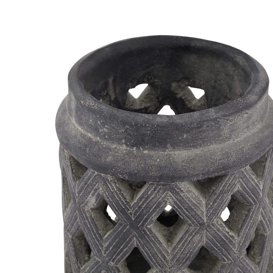 Grey Lattice Lantern with ceramic base and metal detailing, casting geometric shadow patterns, weathered grey finish by Sostter at brixbailey.com