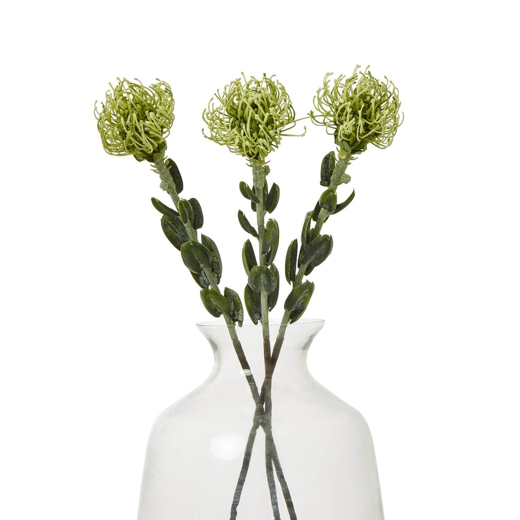 Lifelike pincushion protea spray with spherical blooms and lush green foliage, artisan-crafted faux botanical for home decor by Sostter at brixbailey.com