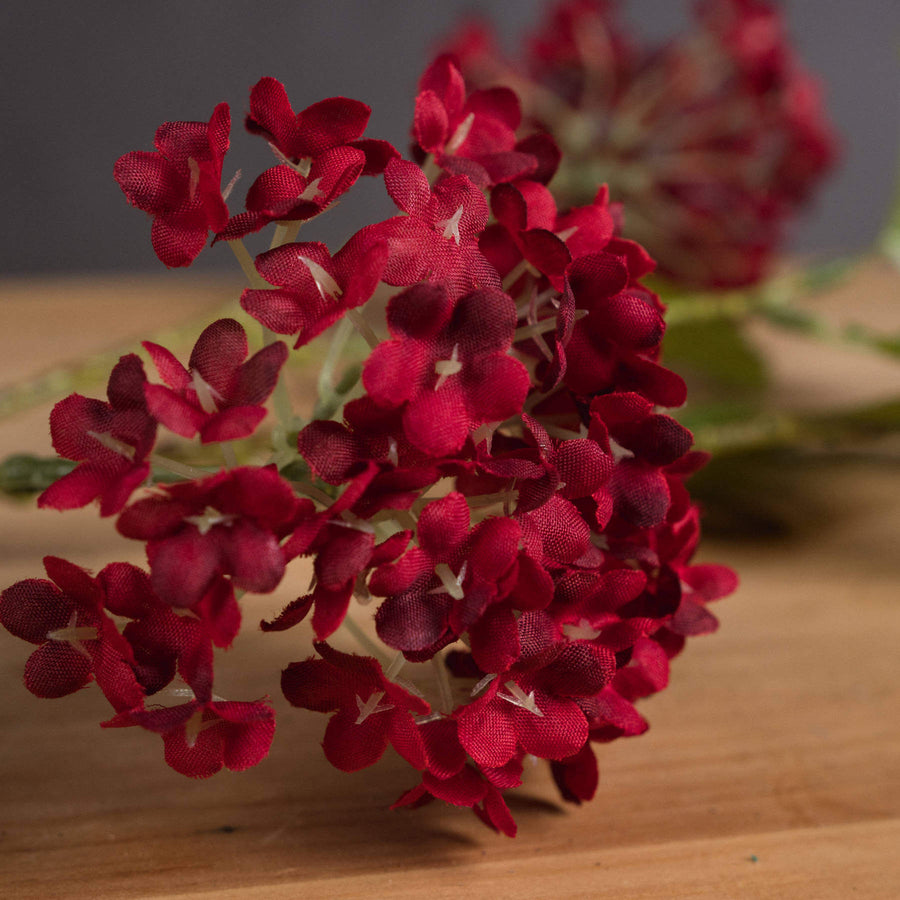 Lifelike artificial viburnum stem with deep crimson berries for autumn floral arrangements, 63cm tall. by Sostter at brixbailey.com