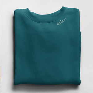 a soft beige organic cotton sweatshirt for dad with cozy vater embroidery in warm morning light