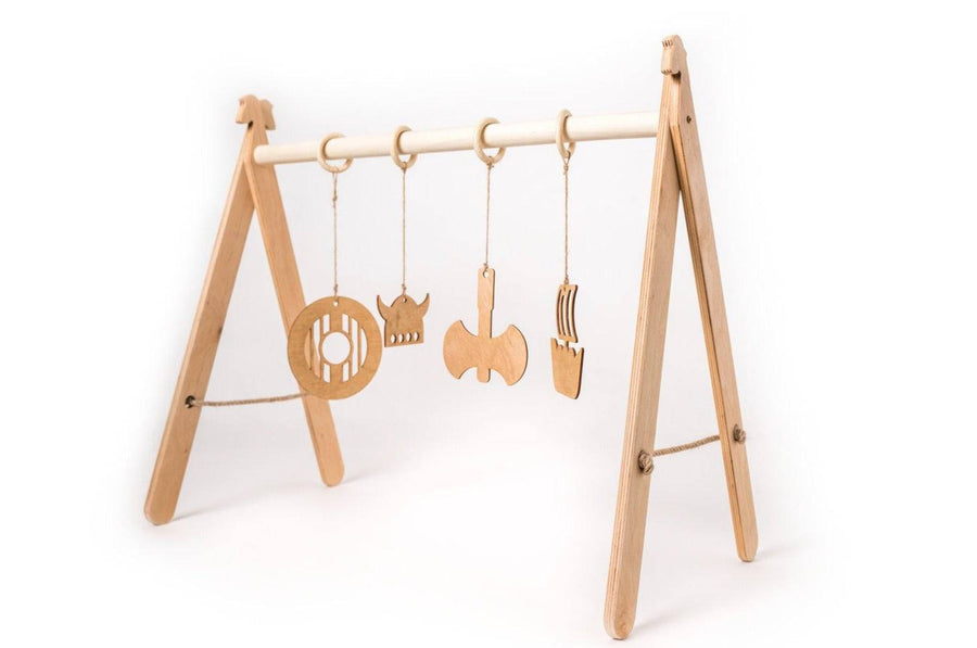 Viking-Themed Wooden Baby Gym – Safe & Fun Development Toy by Ewart Woods at www.brixbailey.com