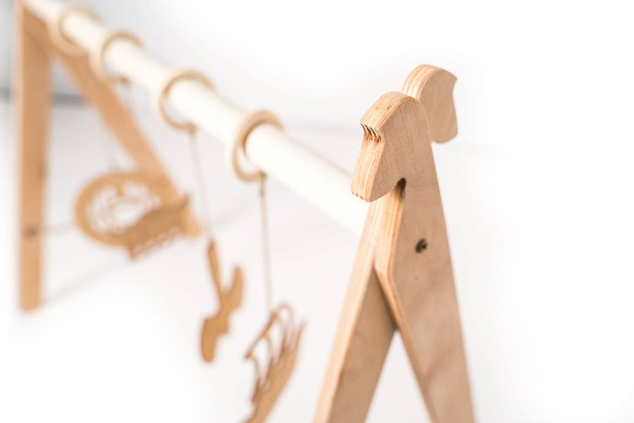 Viking-Themed Wooden Baby Gym – Safe & Fun Development Toy by Ewart Woods at www.brixbailey.com