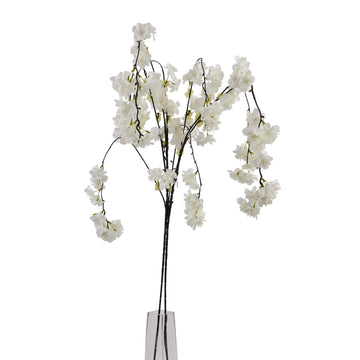 White Japanese cherry blossom stems, hyper-realistic artificial floral arrangement, 100cm tall with clustered blooms by Sostter at brixbailey.com