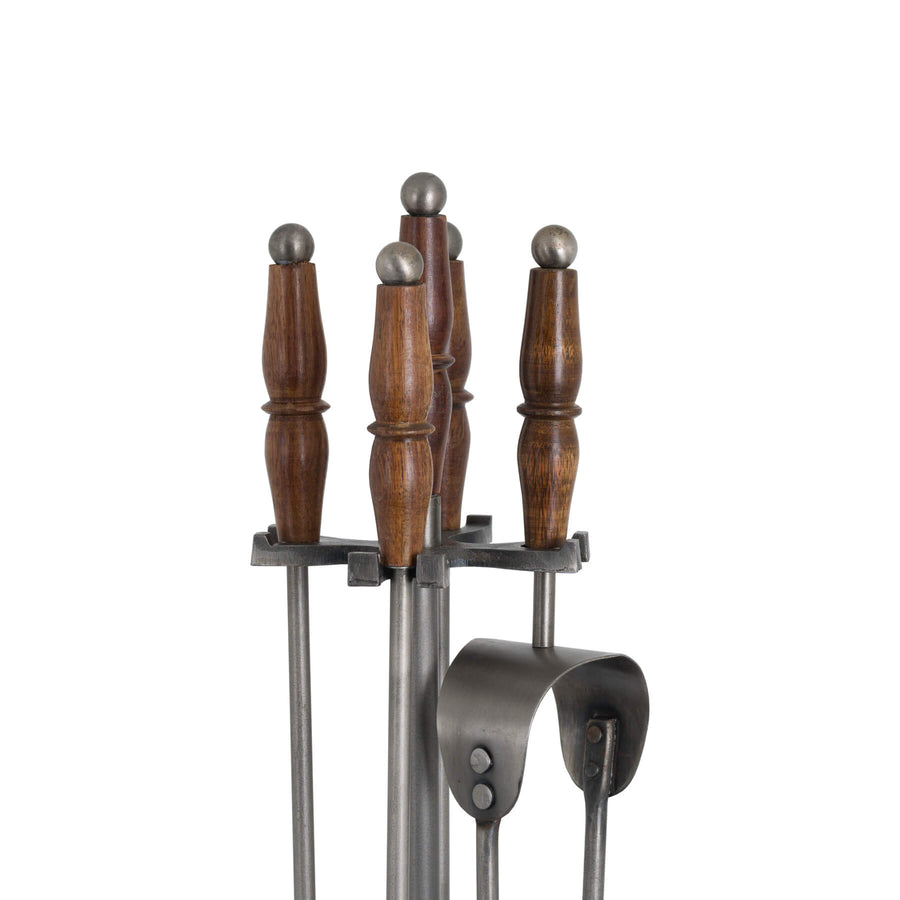 Handcrafted antique pewter fireplace companion set with wooden handles, elegant patina finish, and intricate metalwork. by Sostter at brixbailey.com