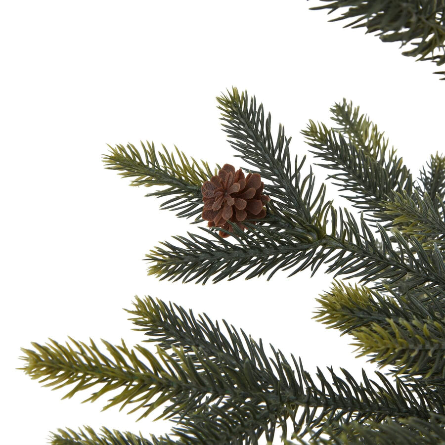 Handcrafted artificial spruce tree arrangement in wicker basket, lush green needles, rustic modern decor for year-round display. by Sostter at brixbailey.com