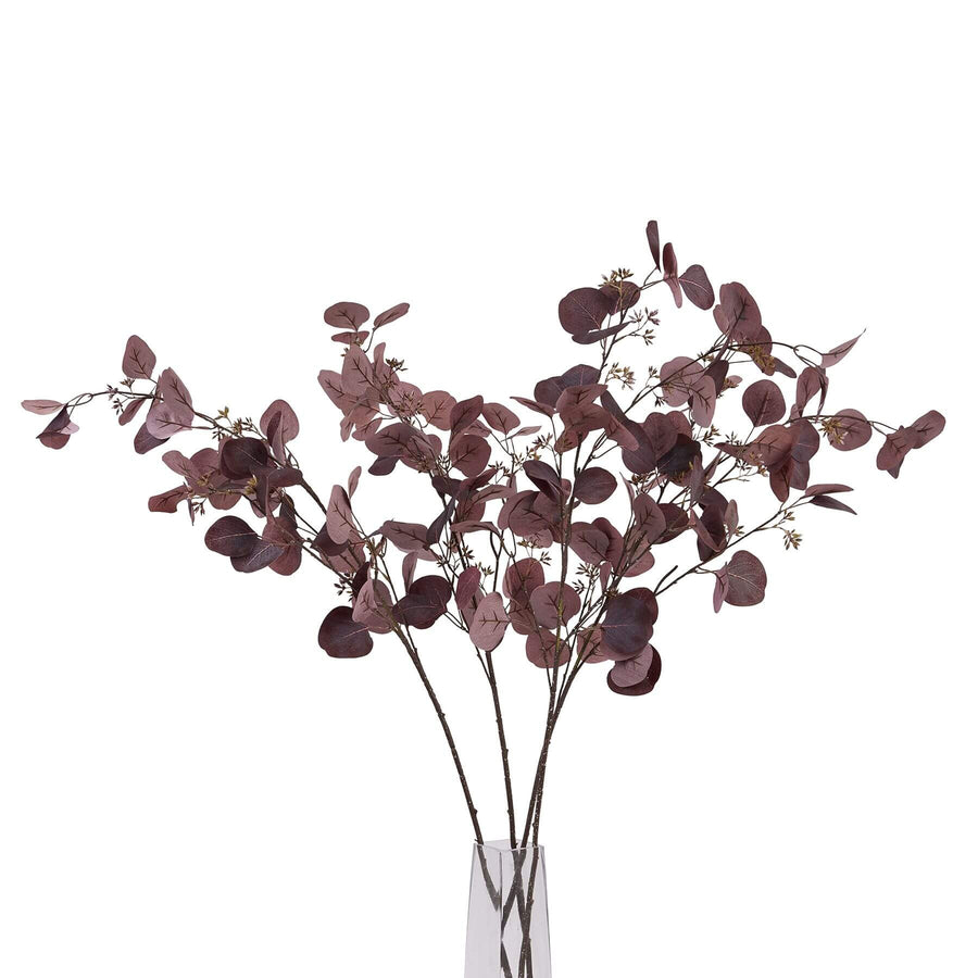 Burgundy berried eucalyptus stem with lifelike plastic leaves and berries for seasonal home decor by Sostter at brixbailey.com