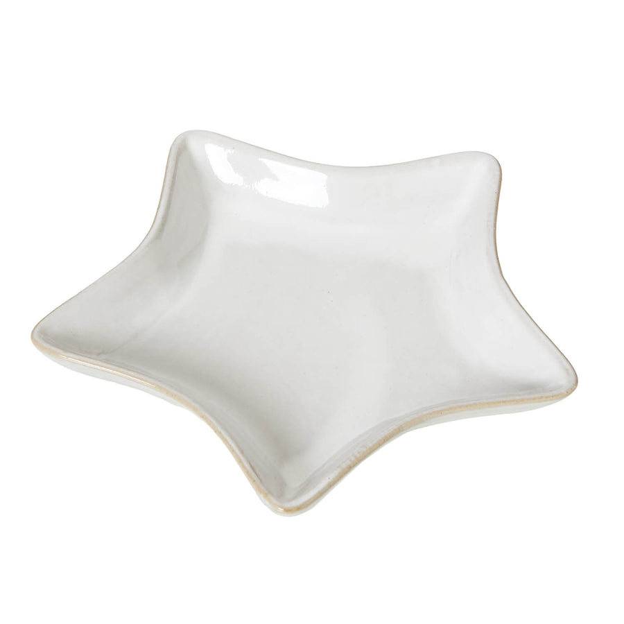 Minimalist white ceramic star dish for home dÃ©cor, handcrafted with smooth edges and luminous finish, 17cm wide. by Sostter at brixbailey.com