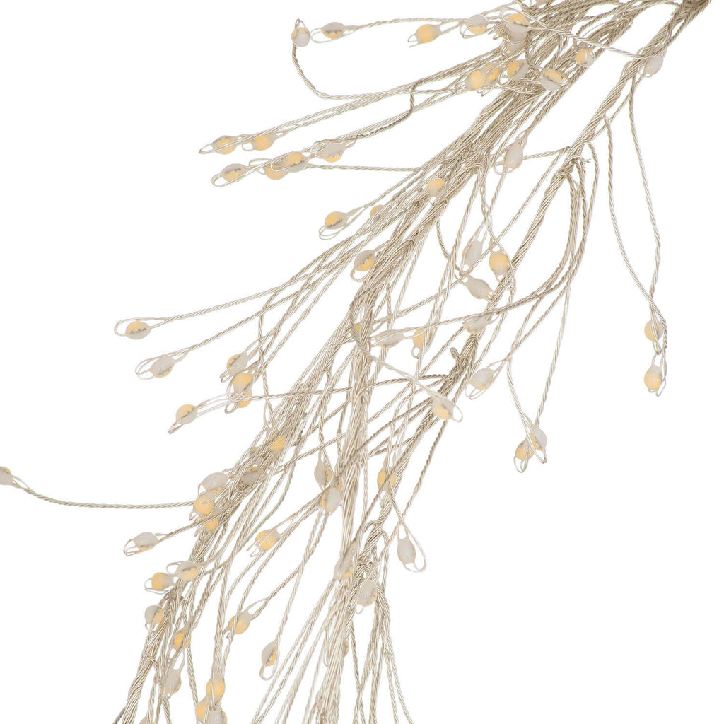 Warm white LED cluster string lights with 432 miniature bulbs, silver wiring, and 8 lighting sequences for cozy ambiance by Sostter at brixbailey.com