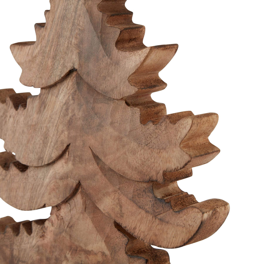 Handcrafted natural wooden Christmas tree with rich brown grain, minimalist silhouette, and artisan craftsmanship. by Sostter at brixbailey.com
