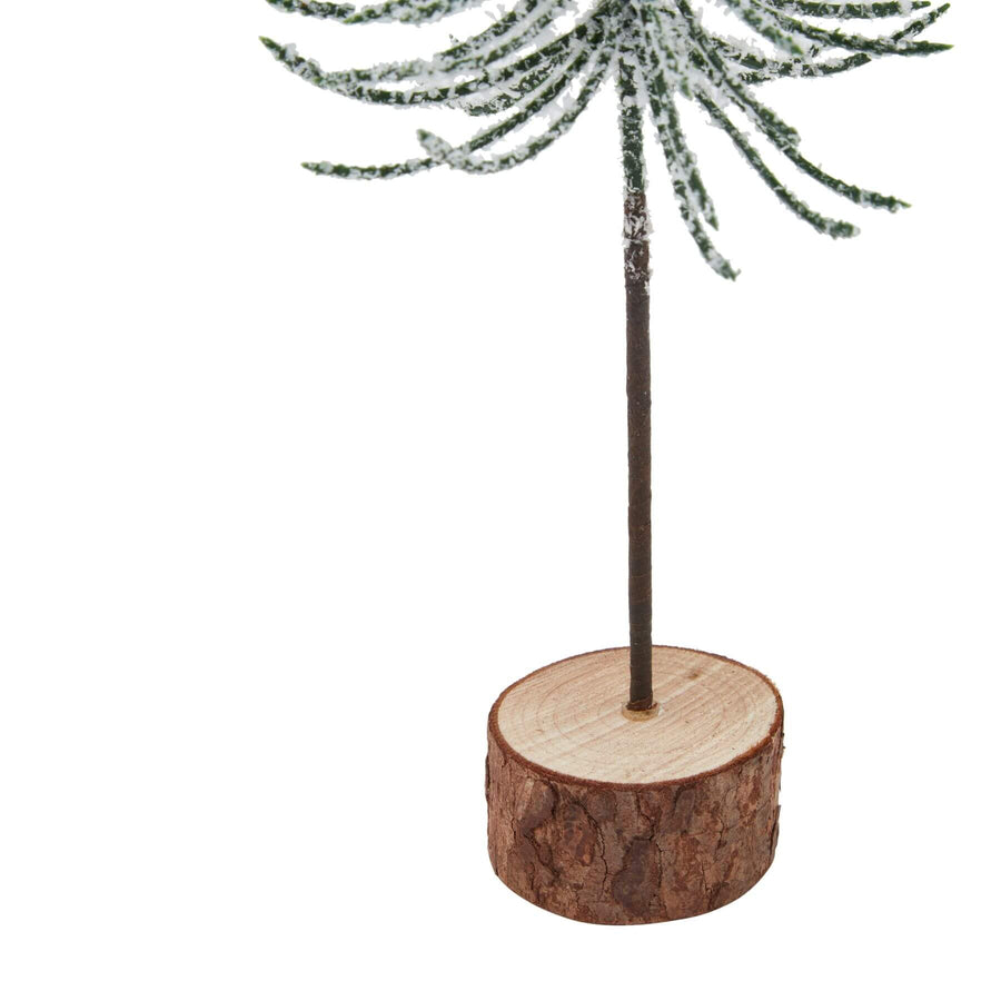Frosted spindle tree decor with wooden base and crystalline branches, winter-themed centerpiece for holiday styling by Sostter at brixbailey.com