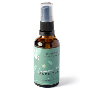 bold close-up of face tonic with lemon balm spray catching the light