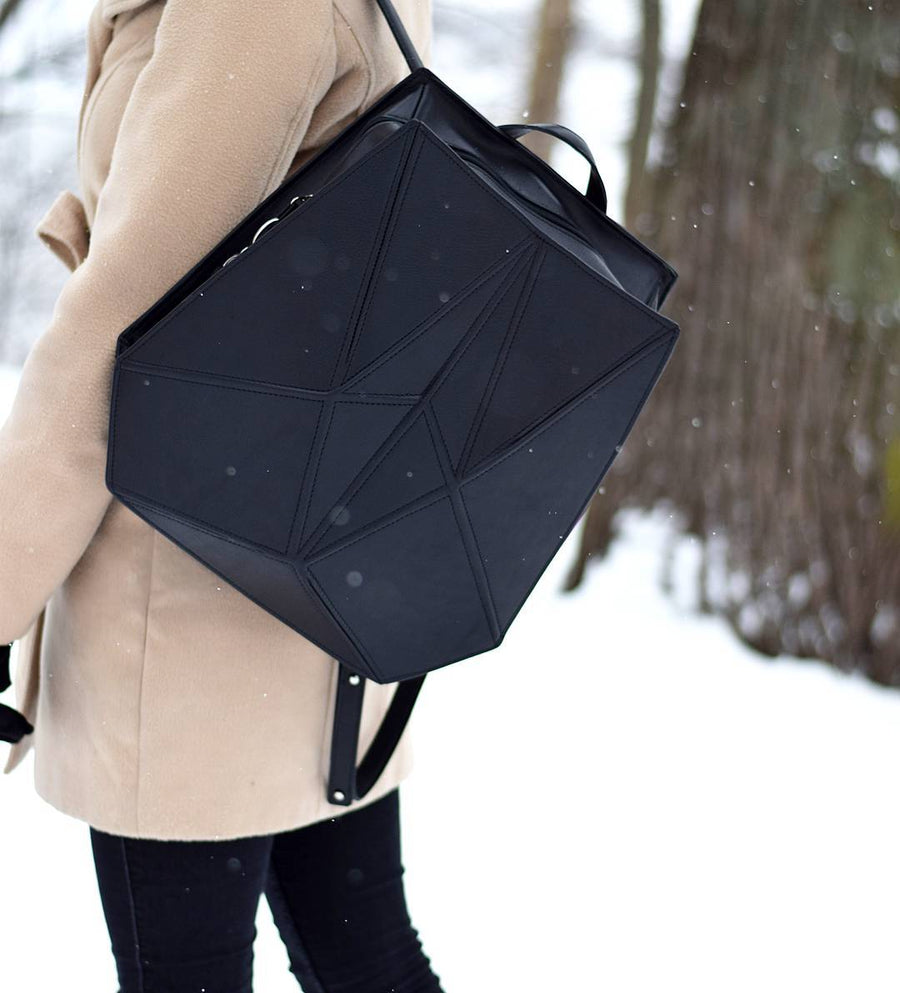 FACET Black Leather Backpack – Timeless Elegance & Functionality by Gerda Retter Design at www.brixbailey.com