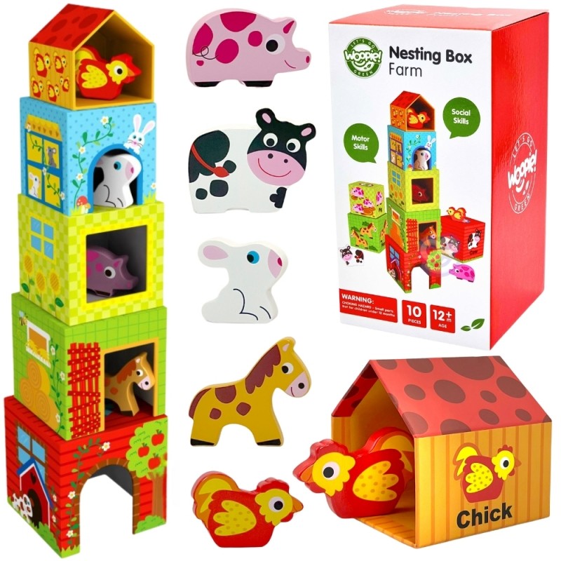 bold close-up of a toddler's hands stacking the largest farm cube puzzle box