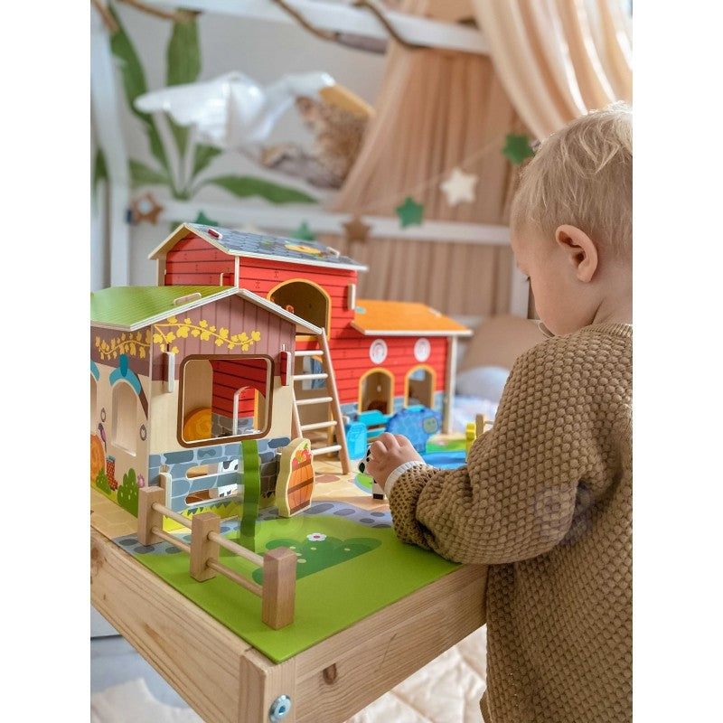 practical layout of the woopie green mega farm set showing all 18 wooden pieces neatly arranged