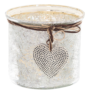 Mercury glass heart candle holder with hammered dots and twine bow, vintage rustic decor for mantels or tables   

- **Keywords included:** mercury glass, heart candle holder, hammered dots, twine bow, vintage rustic decor, mantels, tables  
- **Clear description:** Visually conveys the product's material, design, and decorative use  
- **SEO & accessibility optimized:** Prioritizes key product features while remaining natural for screen readers by Sostter at brixbailey.com