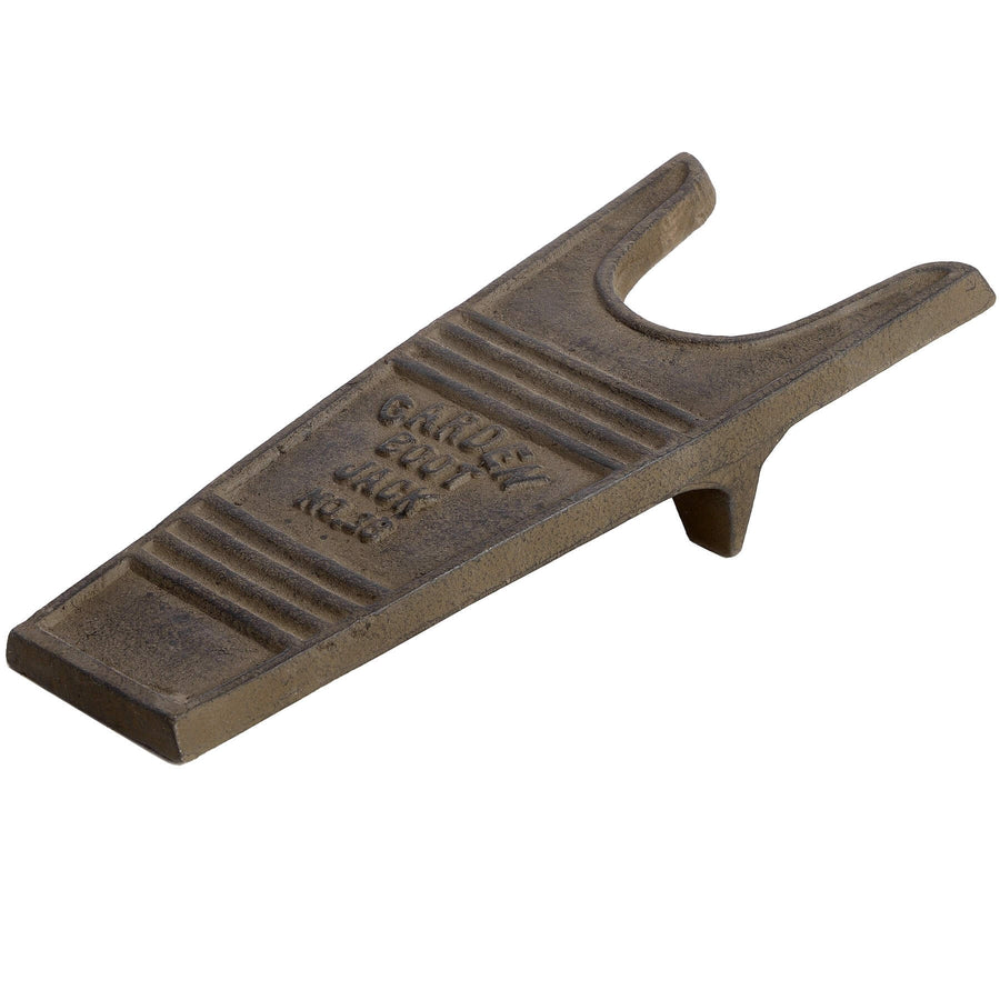 Handcrafted cast iron boot jack with rustic brown patina for effortless boot removal, durable entryway decor by Sostter at brixbailey.com