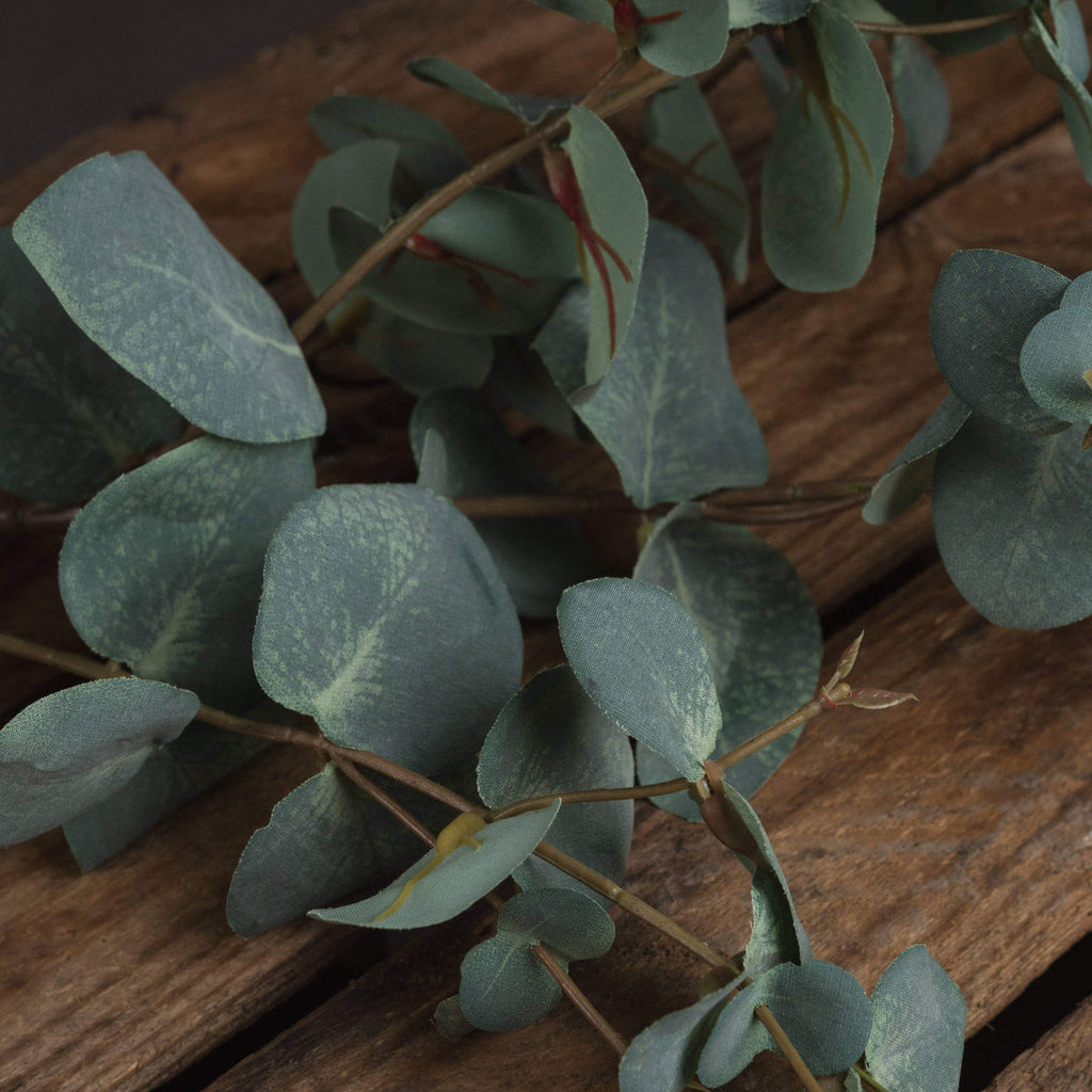 Lifelike variegated faux eucalyptus stem in sage green, handcrafted plastic botanical decor for home or office by Sostter at brixbailey.com