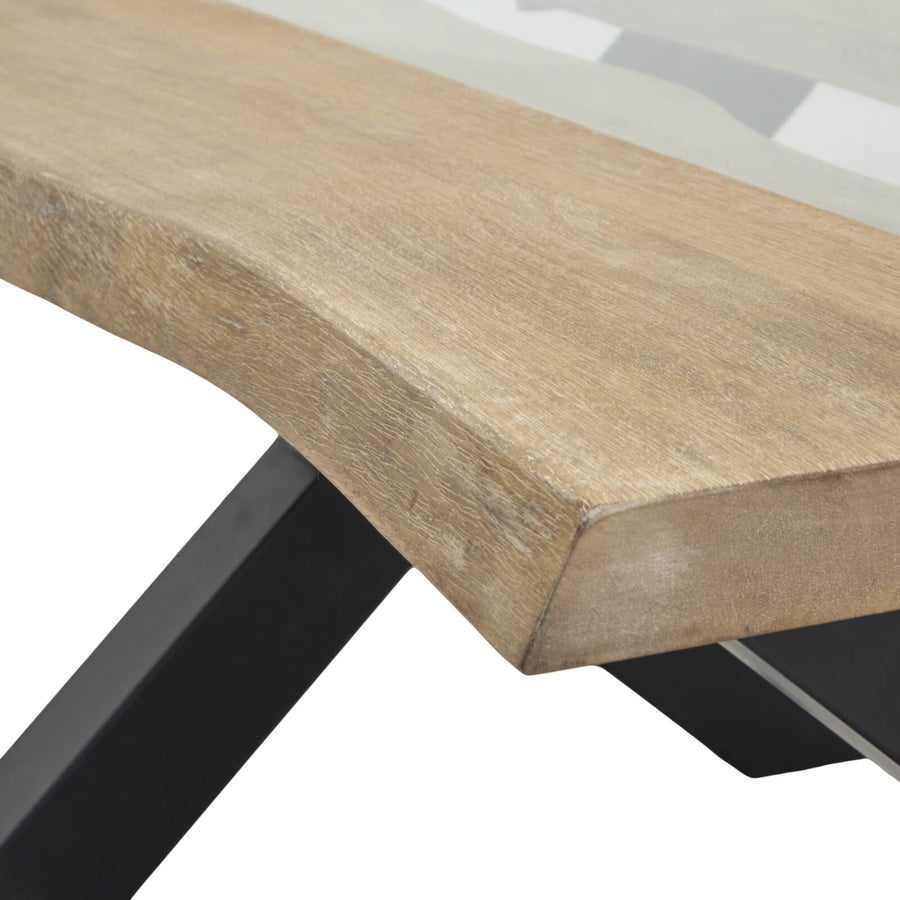 Live edge coffee table with acacia wood and clear resin inlay, natural wood tones and black accents by Sostter at brixbailey.com