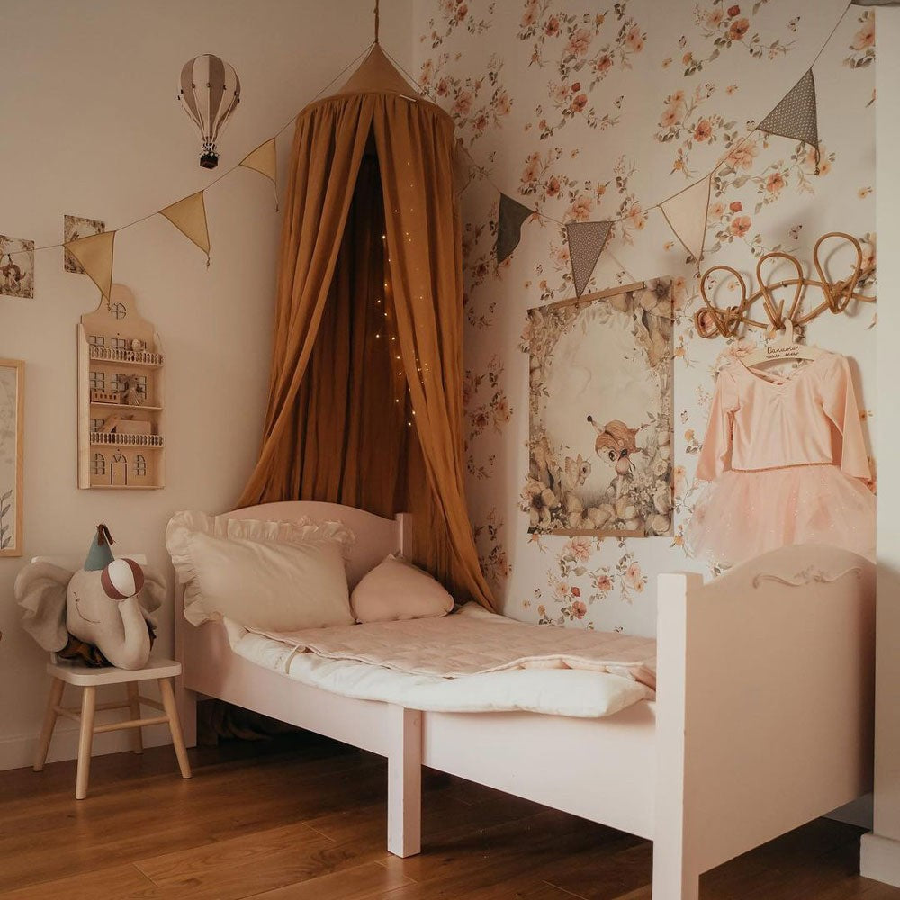close-up of charming floral vintage wallpaper with soft pastel tones on a snow-white base