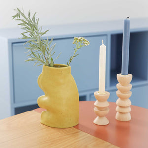 bold pistachio ceramic vase with dramatic flowing lines and a confident handmade presence