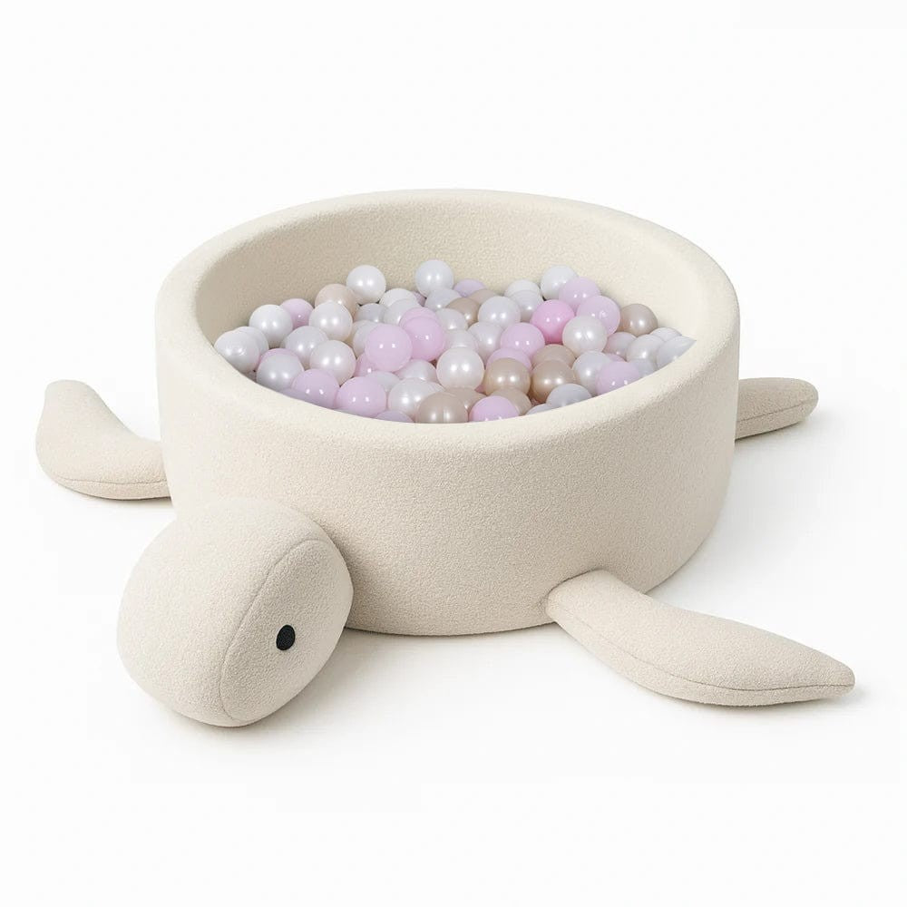 playful turtle ball pit in cozy beige boucle, filled with colorful balls for a fun baby playtime