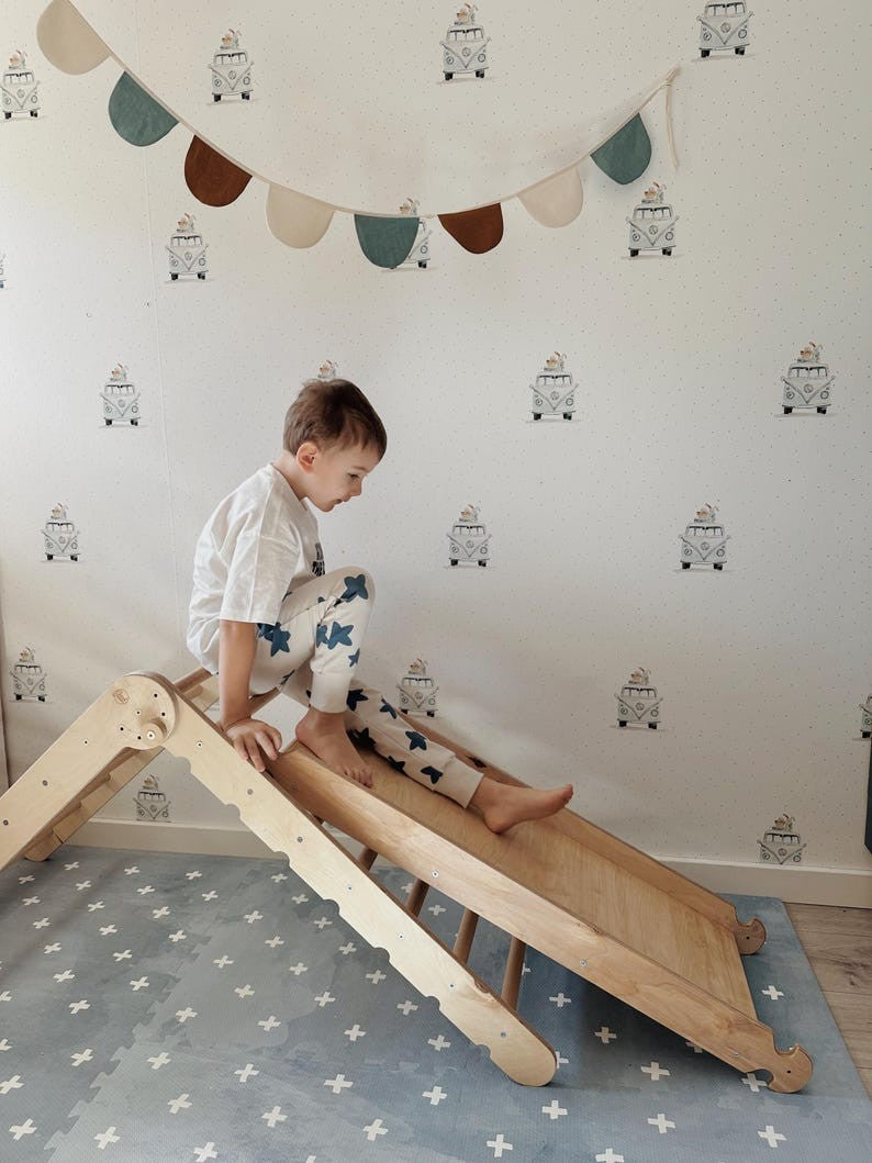 bold cross azure foam playmat in dramatic low-angle studio lighting