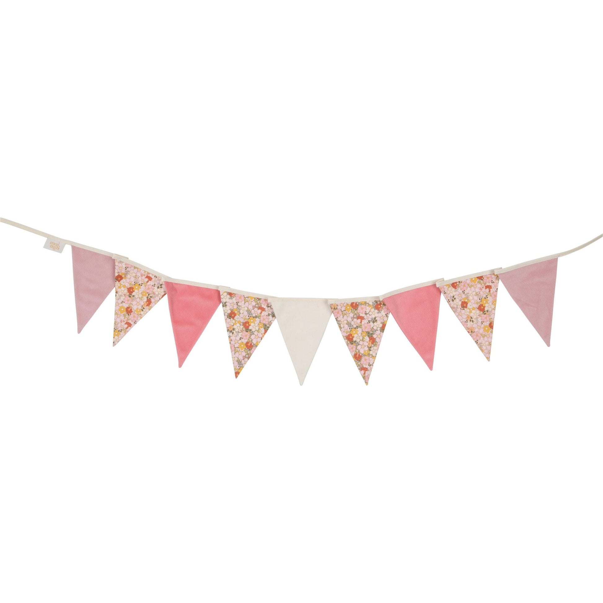 elegant cotton and velvet birthday garland with mint pendants, draped gracefully over a garden-themed nursery crib