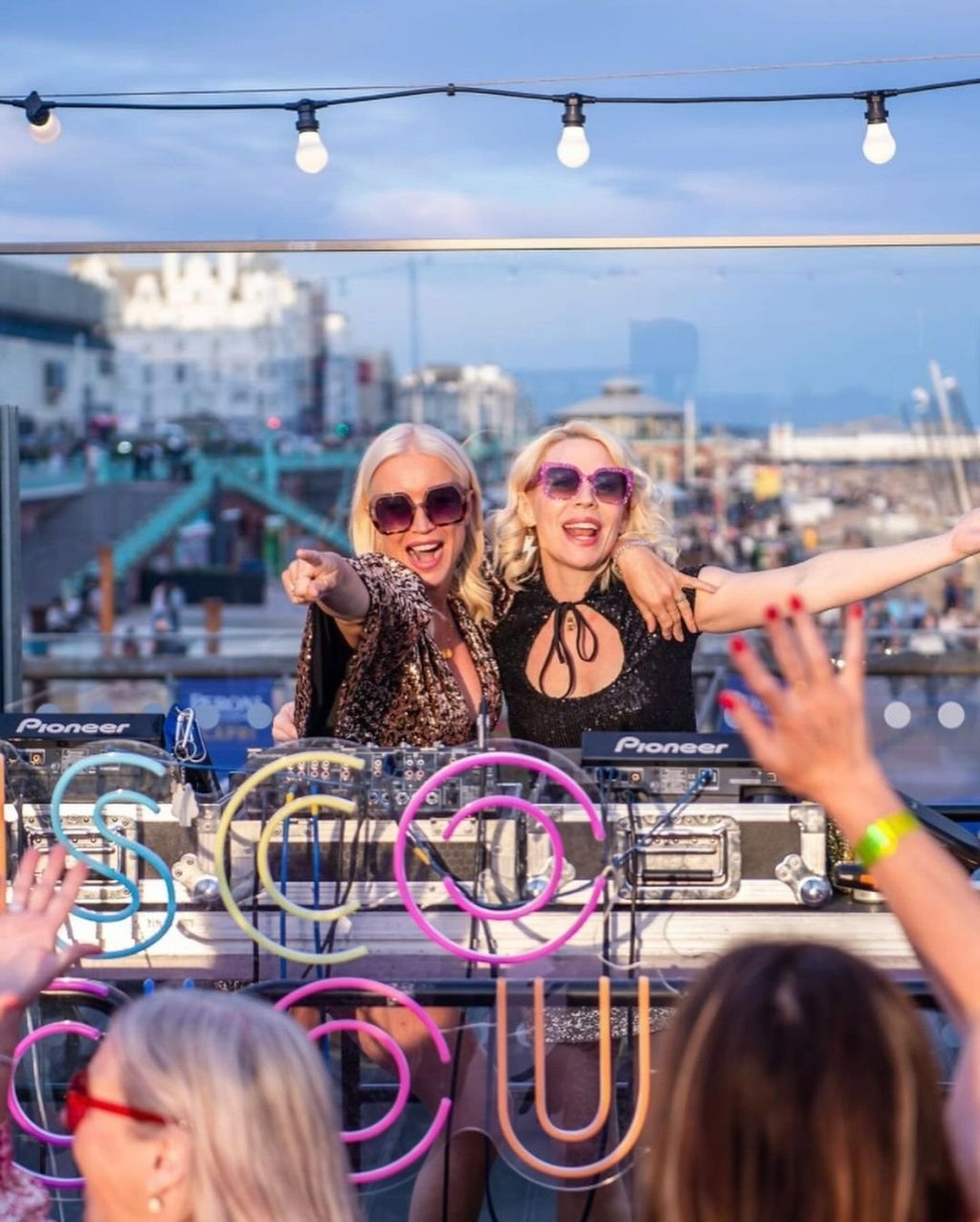 Gold and cheetah lightning bolt earrings