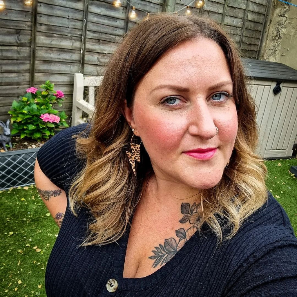 Gold and cheetah lightning bolt earrings